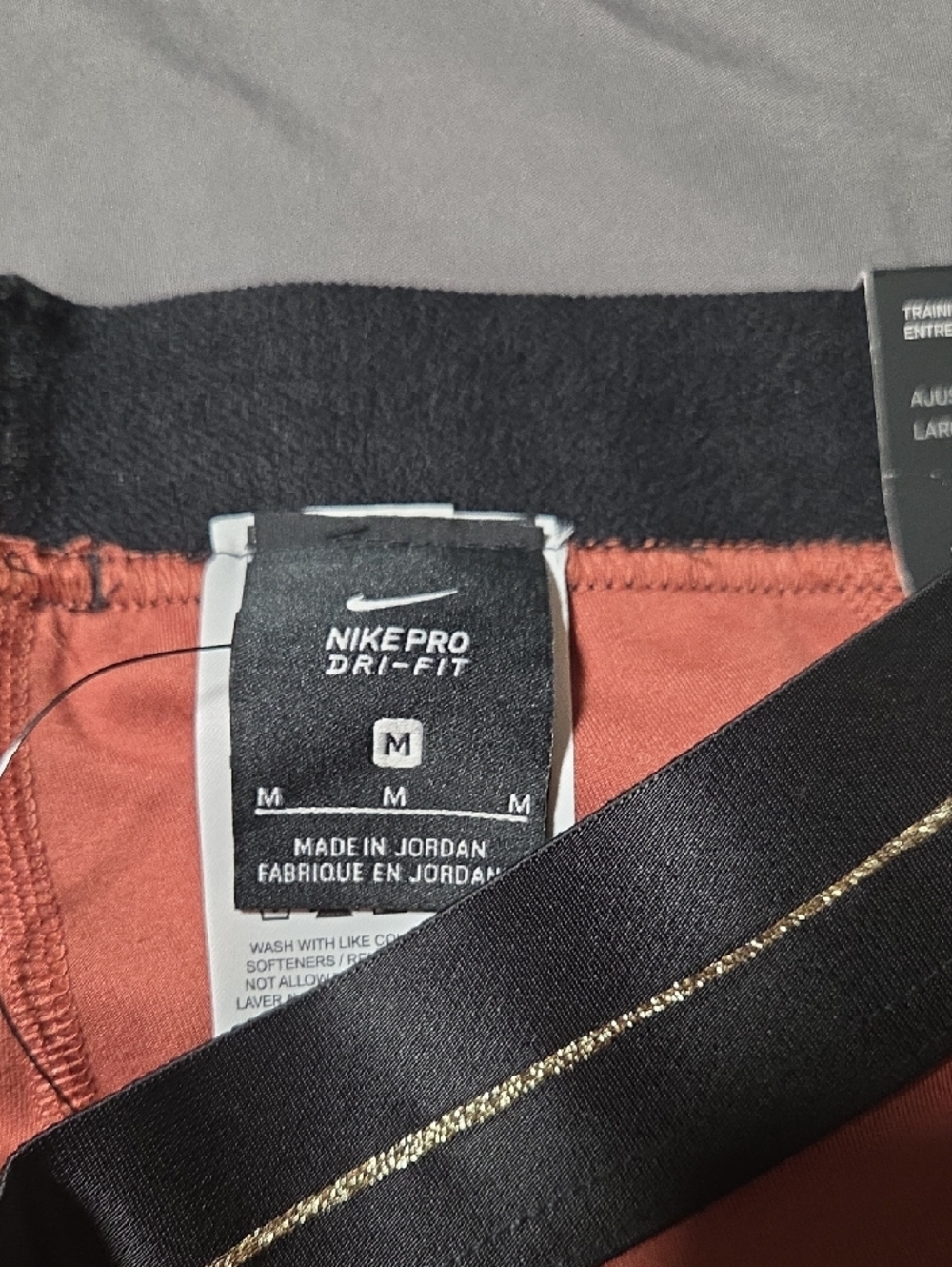 Nike Rust Salmon Leggings with Gold Swoosh - Picture 4 of 6